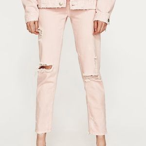 MID-RISE RIPPED JEANS